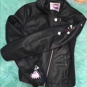 Black leather jacket that says girls run the world
